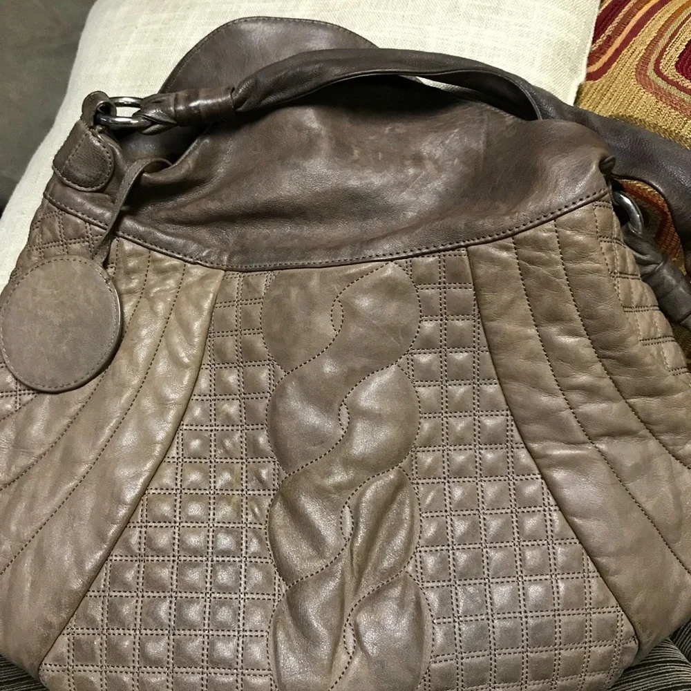Oversized Gently used Leather Satchel.